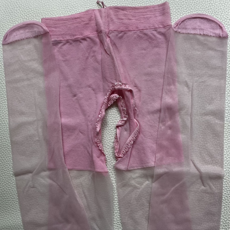 Uudet tosi ohuet läpikuultavat vaaleanpunaiset sukkahousut. Koko XS.